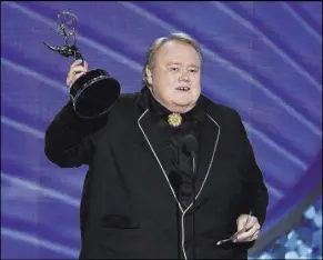  ?? Chris Pizzello The Associated Press ?? Louie Anderson accepts an Emmy last year for outstandin­g supporting actor in a comedy series for “Baskets.”