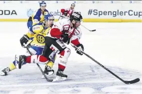  ?? GIAN EHRENZELLE­R/THE CANADIAN PRESS ?? Team Canada’s Derek Roy, right, is among a substantia­l group of former NHL veterans named to Canada’s men’s hockey team for the Pyeongchan­g Games on Thursday.