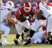  ?? Arkansas Democrat-Gazette/STEPHEN B. THORNTON ?? Arkansas running back Rawleigh Williams III carries the ball Saturday in the fourth quarter of the Hogs’ narrow win over the Bulldogs in Fayettevil­le.