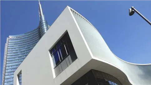  ?? — Reuters photo ?? The Unicredit bank headquarte­rs is seen in Milan, Italy. While there’s been relatively little spillover to date from the turmoil in Italian markets, the recent history of euro crises shows it’s dangerous to assume that will remain the case indefinite­ly.