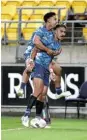  ?? Picture: PHIL WALTER/GETTY IMAGES ?? ON TOP: Rieko Ioane of the Blues celebrates his try with Stephen Perofeta, left, during the round one Super Rugby Aotearoa against the Hurricanes on Saturday in Wellington