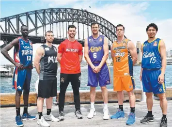  ?? Picture: JOEL CARRETT/AAP ?? READY TO PLAY: (From left) Majok Deng (Adelaide 36ers), Chris Goulding (Melbourne United), Angus Brandt (Perth Wildcats), Andrew Bogut (Sydney Kings), Lucas Walker (Cairns Taipans) and Makoto Hiejima (Brisbane Bullets) at the NBL/WNBL season launch in Sydney yesterday.