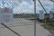  ??  ?? In this Sept. 6photo, the Miami Drum Services Superfund cleanup site in a fenced off area behind a rail yard.