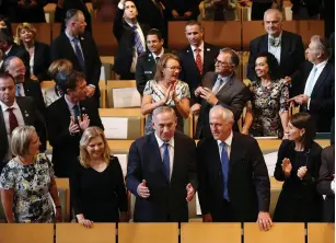  ?? (Reuters) ?? PRIME MINISTER Benjamin Netanyahu and Australian Prime Minister Malcolm Turnbull attend a service at Sydney’s Central Synagogue last February along with their wives, Sara and Lucy.