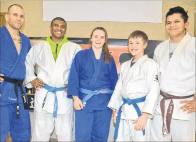  ?? COLIN MACLEAN/JOURNAL PIONEER ?? Summerside’s Toshidokan Judo Club (TJC) is sending three members to the Elite 8 – national championsh­ips in Montreal this weekend. From left: Chris Townsend, head sensei at TJC, George Madumba, Ellen Gillis, Mikey Perry and Sebastian Nash. Perry is a...