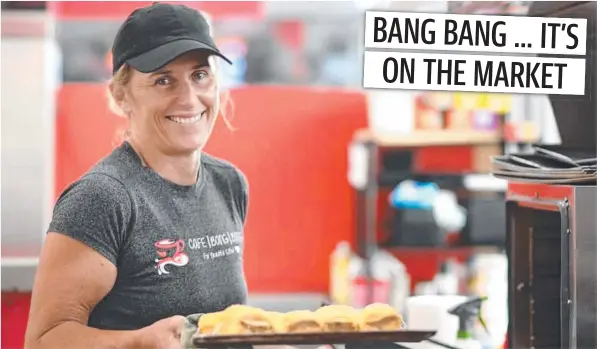  ?? ?? Cafe Bang Bang owner Clare James at the Mission Beach premises which has been listed on the market after nine years of trading.