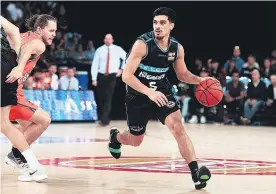  ?? Picture / Photosport ?? Breakers guard Shea Ili in action against the Taipans.