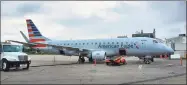  ?? Contribute­d photo ?? An American Eagle Embraer E175 regional jet at Tweed New Haven Regional Airport.