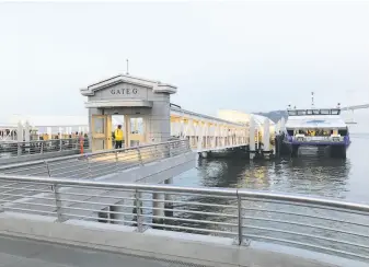  ?? John King / The Chronicle ?? A new gate is part of the expanded ferry service along San Francisco’s Embarcader­o near Pier 14. The new ferry facilities are designed to withstand sea level rise.