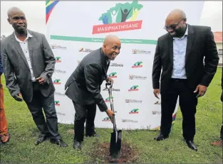  ?? Picture:LULAMILE FENI ?? IT’S OFFICIAL: Eastern Cape premier Phumulo Masualle attends the sod-turning ceremony yesterday for the R2-million hall to be built at New Payne village near Mthatha. Nkosi Ntabozuko Njemla, left, and KSD mayor Dumani Zozo were also in attendance