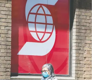  ?? PETER J. THOMPSON ?? Scotiabank is seeing requests for mortgage payment deferrals plateau. However, its second-quarter profit took blows from the pandemic, falling 41 per cent year-over-year.