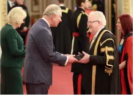  ??  ?? Above: Professors McCormac and Stead at Buckingham Palace