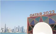  ?? REUTERS ?? A Qatar 2022 logo is seen in front of the skyline of the West Bay in Doha.