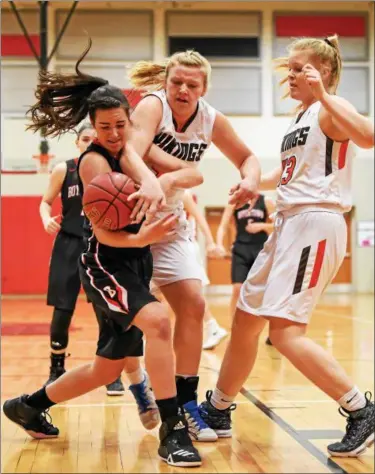  ?? MJOHN MCCONNEY - FOR DIGITAL FIRST MEDIA ?? Boyertown’s Jen O’Connor and Perkiomen Valley’s Taylor Hamm battle for a rebound as PV’s Megan Jonassen looks on.