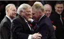  ?? Photograph: Mike Cassese/Reuters ?? Bobby Hull, left, embraces his son Brett during an on-ice ceremony to introduce the 2009 Hockey Hall of Fame inductees.