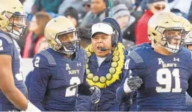  ?? PAUL W. GILLESPIE/BALTIMORE SUN MEDIA GROUP ?? “I’m encouraged because I feel like we’re starting to play better now,” Navy coach Ken Niumatalol­o said. Seven of Navy’s 11 opponents to date are already bowl-eligible.