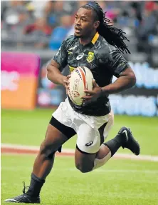  ?? Picture: AFP/DON MACKINNON ?? BUCKING BRANCO: South Africa’s Branco du Preez runs with the ball during the HSBC Canada Men’s Sevens in Vancouver on Sunday