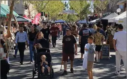  ?? NEWS-SENTINEL FILE PHOTOGRAPH ?? The Lodi Street Faire had a large turnout last October. The street faire, held in May and Ocober each year, is one of the Lodi Chamber of Commerce’s signature events.