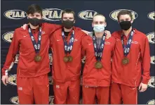  ?? COURTESY DANIEL BOONE ATHLETICS (LEFT), OJR ATHLETICS (RIGHT) ?? At left, Daniel Boone’s Chris Guiliano poses with his two gold medals after his event wins at the PIAA 3A Championsh­ips Saturday. At right, Owen J. Roberts swimmers, from left, Jonah Kasznay, Nathan VanNatter, Dalton Fink and Will Cano pose with their relay medals.