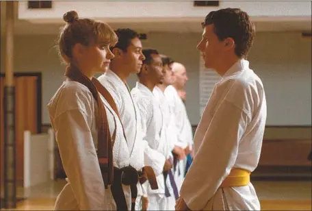  ?? Bleecker Street ?? IMOGEN POOTS and Jesse Eisenberg as karate students in writer and director Riley Stearns’ unnerving “The Art of Self-Defense.”