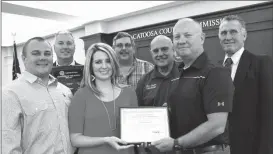  ??  ?? Employee of the month Katie Thomason, along with her fiancee Jake Sponberger, was honored during the Catoosa County Board of Commission­er’s meeting on July 19. From left: Sponberger, County Manager Jim Walker, Thomason, Commission­er Jeff Long,...