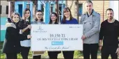  ??  ?? Lord’s Palace Hotel marketing and communicat­ions director Melisa Demir (third from the right) and her colleagues present cheque to the SOS Children’s Village national director Refika İnce (third from left), SOS Children’s Village manager Ahmet Akarsu...