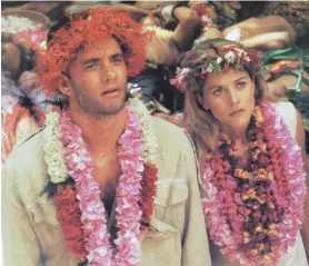  ?? ?? Tom Hanks with co-star Meg Ryan in “Joe Versus the Volcano”