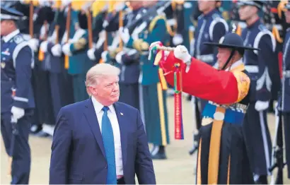  ?? Picture: Reuters ?? INSPECTION TIME. US President Donald Trump during a welcoming ceremony at the Presidenti­al Blue House in Seoul, South Korea, yesterday.