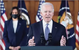  ?? Patrick Semansky / Associated Press ?? President Joe Biden speaks after meeting with leaders from Georgia’s Asian-American and Pacific Islander community Friday at Emory University in Atlanta, as Vice President Kamala Harris listens.