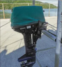  ??  ?? It’s easier to work on an outboard engine if it’s off the boat and mounted on a stand, even a jury-rigged one in a yard.