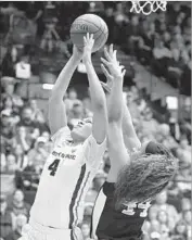  ?? Timothy J. Gonzalez Associated Press ?? BREANNA BROWN of Oregon State goes up for a shot against Long Beach State’s Darshana Ta’afua.