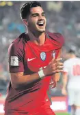  ??  ?? Here we go: Andre Silva after putting Portugal 2-0 ahead
