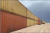  ?? ARIZONA GOVERNOR’S OFFICE, FILE ?? This photo provided by the Arizona Governor’s Office shows shipping containers that will be used to fill a 1,000-foot gap in the border wall with Mexico near Yuma, Ariz.