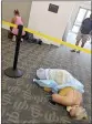  ?? LOUIE LOPEZ ?? Sick people lie on the floor in a medical facility in Jacksonvil­le, Fla., on Wednesday.