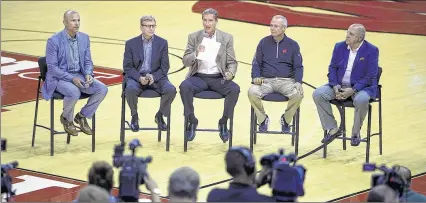  ??  ?? ASSOCIATED PRESS Milwaukee Bucks coach Jason Kidd, GM John Hammond, broadcaste­r Jon McGlocklin, Wisconsin coach Bo Ryan and athletic director Barry Alvarez (from left) talk about the Bucks moving their training camp to Madison.