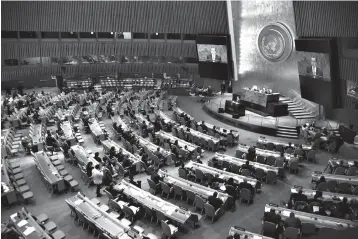  ?? Associated Press ?? ■ China's Foreign Minister Wang Yi addresses the 73rd session of the United Nations General Assembly on Friday at U.N. headquarte­rs.