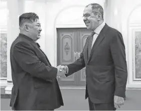  ?? RUSSIAN FOREIGN MINISTRY PRESS SERVICE TELEGRAM CHANNEL VIA AP ?? North Korean leader Kim Jong Un and Russian Foreign Minister Sergey Lavrov meet Thursday. Lavrov arrived in the North Korean capital, Pyongyang, Wednesday.