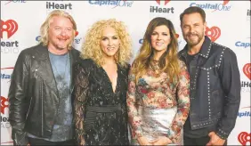  ?? Jack Plunkett / AP ?? Phillip Sweet, from left, Kimberly Schlapman, Karen Fairchild and Jimi Westbrook, of Little Big Town.