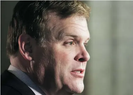  ?? FreD ChArTrAnD/CAnADIAn Press ?? Foreign Affairs Minister John Baird met with reporters over the agreement concerning Iran’s nuclear program on Parliament Hill on Sunday. He expressed doubts over Iran’s ability to keep its end of the bargain reached with the P5+1 nations.