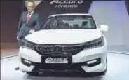  ?? SONU MEHTA/HT ?? Honda Cars India president and CEO Yoichiro Ueno launching the Honda Accord Hybrid Feather in New Delhi on Tuesday.