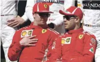  ??  ?? Los compañeros de equipos Kimi Raikkonen y Sebastian Vettel.