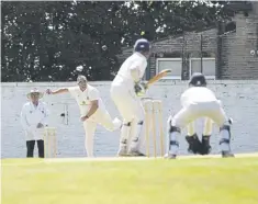  ?? ?? Chris Greenwood traps Mount’s Hanif Kayat lbw