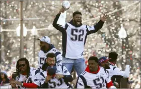  ?? MICHAEL DWYER — THE ASSOCIATED PRESS FILE ?? New England’s Elandon Roberts (52) rides a duck boat during the Patriots parade through Boston to celebrate their win over the Rams in Super Bowl 53. Roberts is condemning his treatment by a Texas sheriff’s deputy who referred to him as a “big black man” during a March traffic stop.