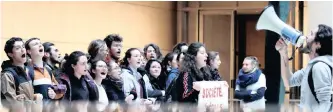  ?? REUTERS/CHARLES Platiau ?? YOUTH block the French bank Société Générale headquarte­rs as part of a ‘youth strike against climate change’ nationwide school protest, in La Defense near Paris, France, on Friday.