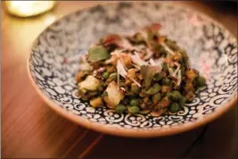  ?? DAI SUGANO — STAFF ARCHIVES ?? Avocado bhel with green chickpea, puffed black rice, togarashi and radish is served at the Palo Alto Indian restaurant Rooh.