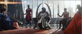  ?? ?? From left, Dorothy Steel as Merchant Tribe Elder, Florence Kasumba as Ayo, Angela Bassett as Ramonda and Danai Gurira as Okoye in a scene from “Black Panther: Wakanda Forever.”