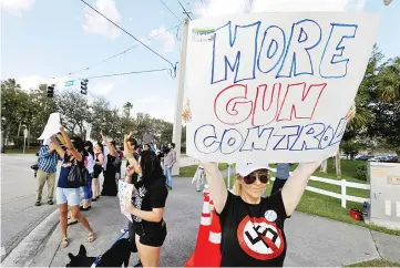  ?? — Reuters photo ?? Jennifer Gennaro joins other parents and students in a demonstrat­ion calling for more gun control at an intersecti­on near Marjory Stoneman Douglas High School, in Coral Springs, Florida.