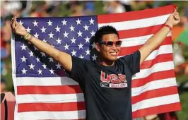  ??  ?? Chronicle file photo / Gary Coronado Tommy Huynh, of Houston, celebrates the Fourth of July at a previous Freedom Over Texas in Eleanor Tinsley Park on Buffalo Bayou in Houston.