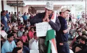  ?? PHOTO: PTI ?? A day after the Allahabad bench of the National Company Law Tribunal admitted IDBI Bank’s insolvency plea against Jaypee Infratech, homebuyers staged a protest outside the Jaypee Group’s Sector 128 office in Noida on Saturday