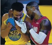  ?? TONY AVELAR — AP ?? Warriors guard Stephen Curry, left, and Portland’s Damian Lillard laugh after Curry’s 62points Sunday.